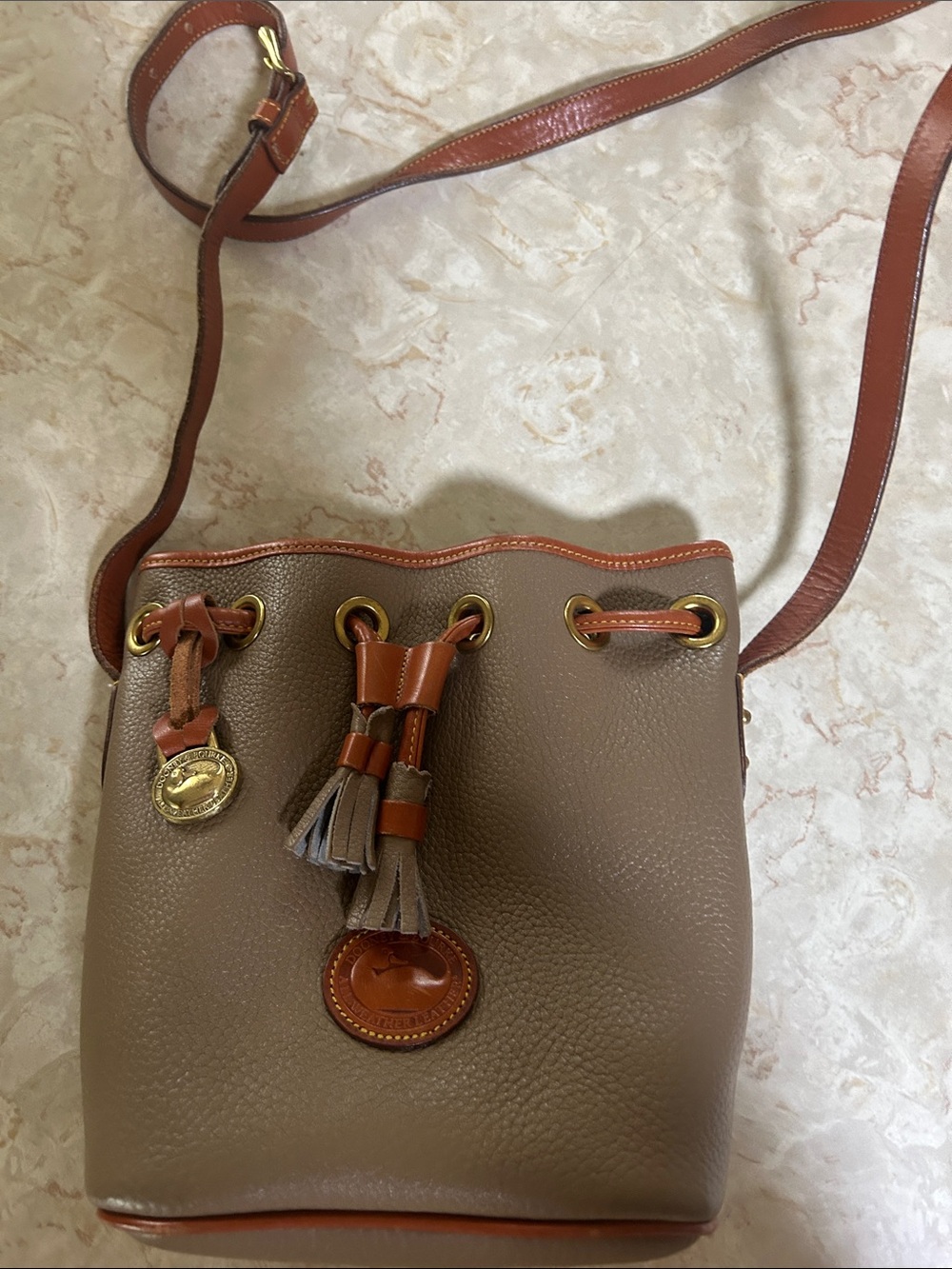 Dooney & Bourke Vintage Taupe and Brown Leather Crossbody Bucket Bag
